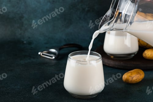 Preview: Potato Milk Being Poured Into a Glass