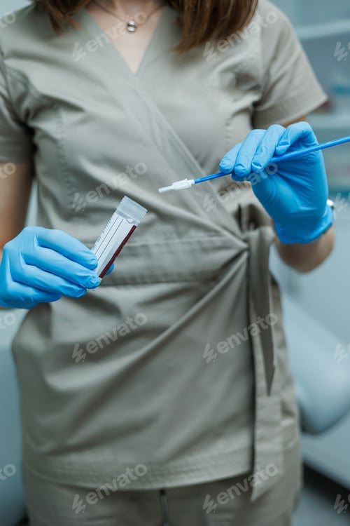 Preview: Smear for virus detection. Taking analysis with a smear. Nurse's hands close-up with a smear.