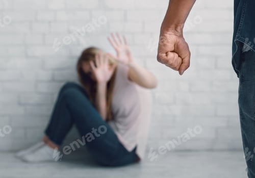 Preview: Man clenches fist about to beat woman, scared wife sits on floor, closes her face