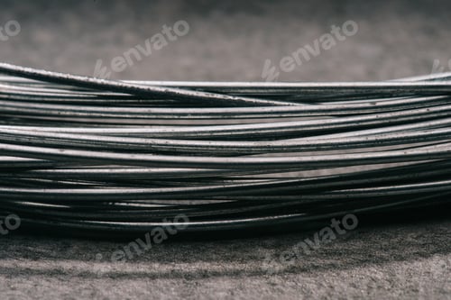 Preview: selective focus of grey wires on tabletop