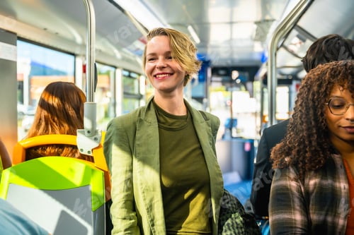 Preview: Woman smiling riding public transport bus looking happy