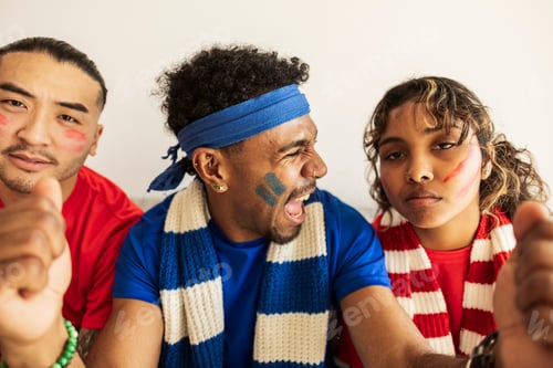 Preview: Diverse sports fans watching game showing varied emotions