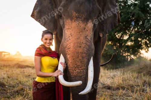 Preview: Elephant and woman in Thailand