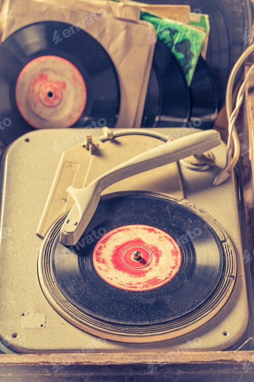 Preview: Classic gramophone with few scratched vinyl records.