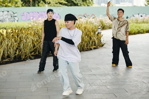 Preview: Dancing Young People in Urban Park Setting