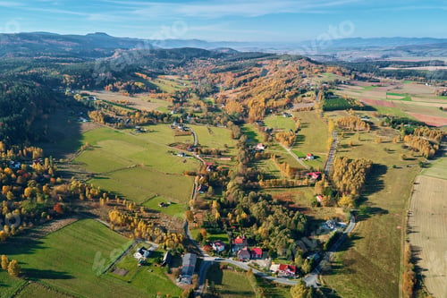 Preview: Mountain village and agricultural fields, aerial view. Nature landscape