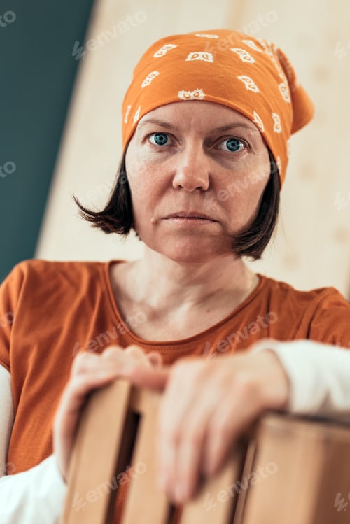 Preview: Proud female carpenter posing with finished wooden crate