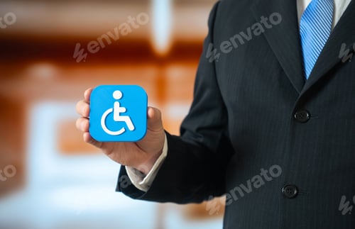 Preview: A symbol of a person with a disability or limited mobility in the hand of an official