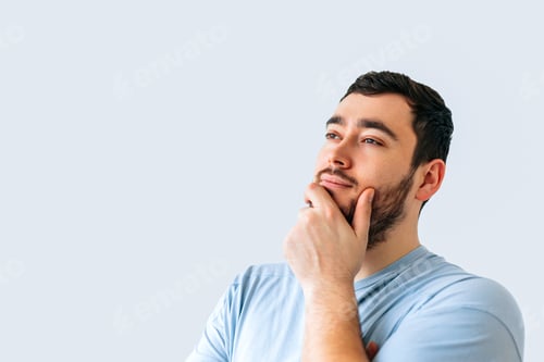 Preview: Pensive customer thinking bearded man, over special offer