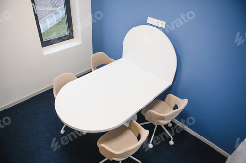 Preview: Modern meeting room interior with table and chairs