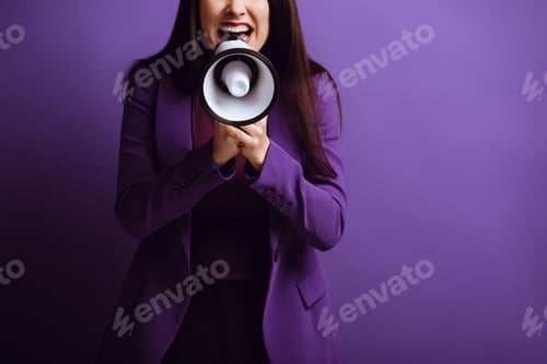 Preview: cropped view of excited woman screaming in megaphone on purple background