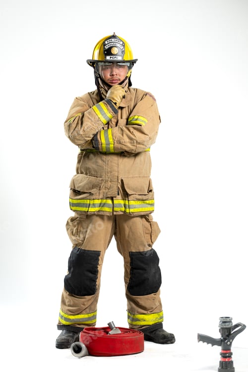 Preview: Portrait of firefighter in full turnout gear stands confidently