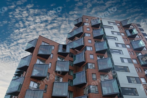 Preview: Exterior of modern red brick house. Architectural detail of close-up on windows, balconies.