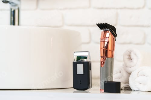 Preview: Electric shaver for men in a bathroom close up