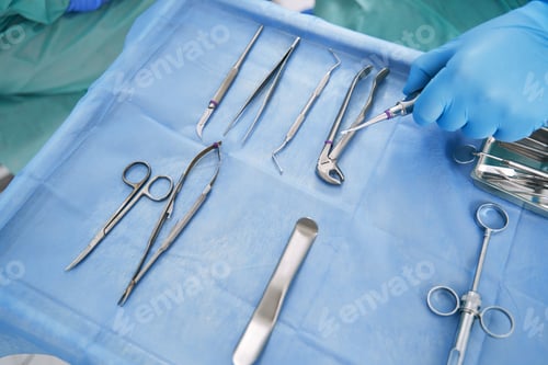 Preview: Doctor hand taking instrument for dental treatment