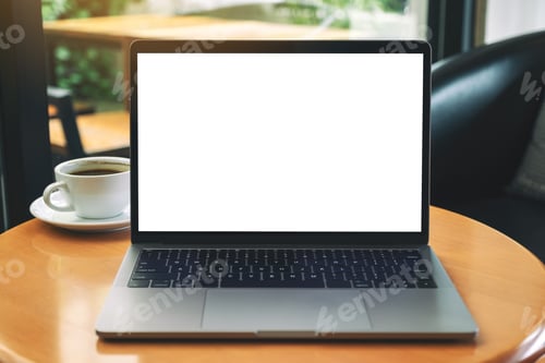 Preview: Mockup image of laptop computer with blank white desktop screen on wooden table