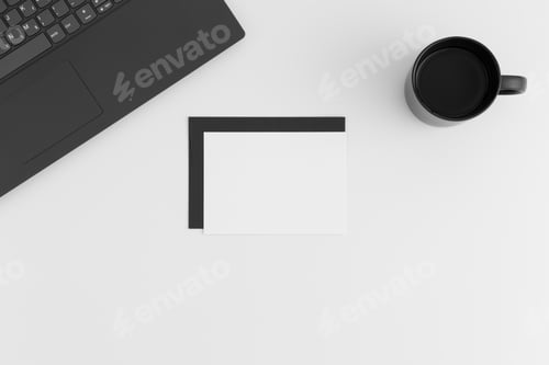 Preview: Top view of a white card mockup and envelope with a laptop and a cup of coffee on a white table.