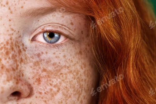 Preview: Portrait of a red-haired girl with freckles