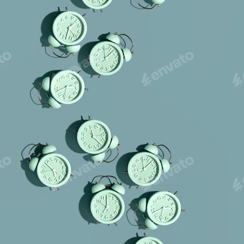 Preview: Top view of creative pattern made of red alarm clocks on a blue background