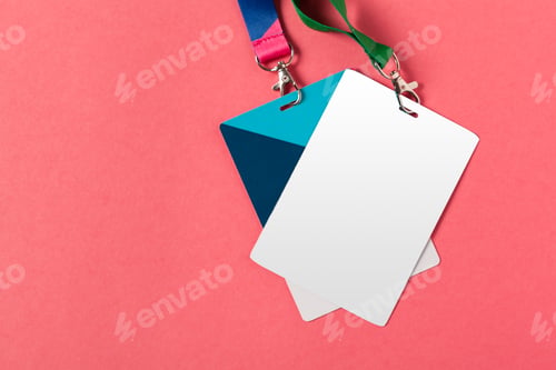 Preview: Colorful lanyards holding blank identification tags on a bright background