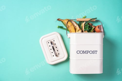 Preview: Sustainable and zero waste living. Vegetable waste in recycling compost pot. top view. Copy space