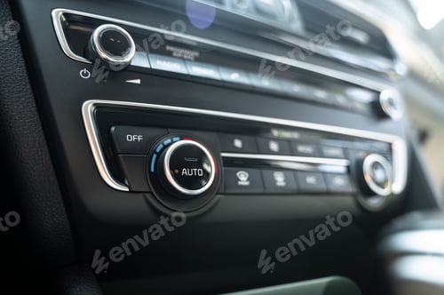 Preview: Close-up of temperature control knob on car dashboard