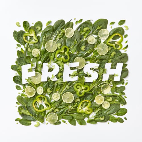 Preview: Fresh spinach, cabbage, asparagus pieces of pepper, cucumber and flower petals on a gray background