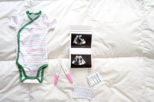 Preview: Pregnancy tests, baby clothes, pills and ultrasound scan on the