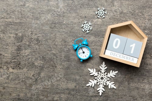 Preview: Christmas wood calendar with new year decorations, aganist colored background.