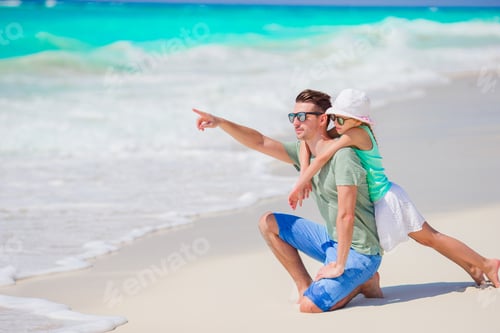 Preview: Family of dad and kid on the beach