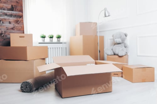 Preview: Moving concept. Room with cardboard boxes