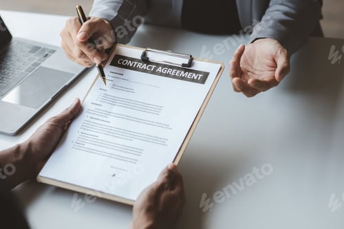 Preview: Rental company employee is calculating the cost for the customer to agree to sign a rental contract