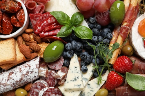 Preview: Set of different delicious appetizers as background, top view