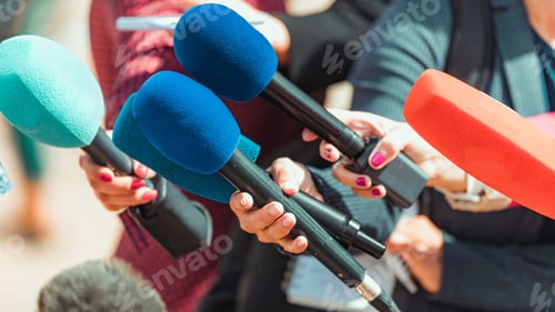 Preview: News reporters interviewing an unrecognizable people outdoors
