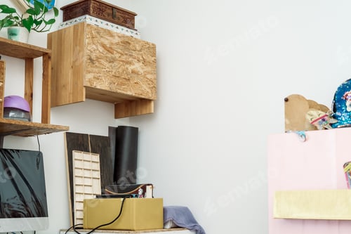 Preview: Interior of a bright and airy home with wooden wall shelf.