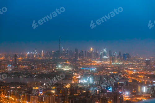 Preview: Night Aerial View Of Dubai Cityscape Skyline. Top View Skyline Cityscape City In Night Illuminations
