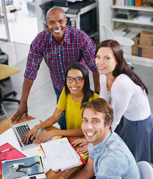 Preview: Bringing your ideas into focus. Shot of a young designers at work in an office.