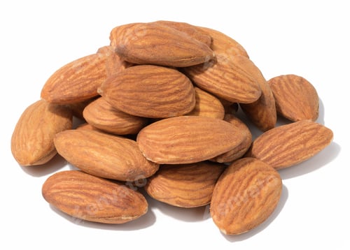 Preview: Almond kernel on a white isolated background, close up