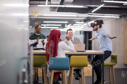 Preview: Young Multiethnic Business team using virtual reality headset