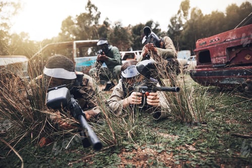 Preview: Paintball, camouflage and team playing a match for fun, fitness and extreme sports with guns. Army,
