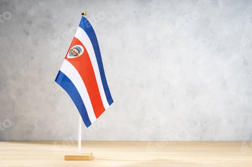 Preview: Costa Rica table flag on white textured wall