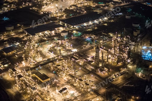Preview: Aerial view of oil refinery illuminated at night, Los Angeles, California, USA