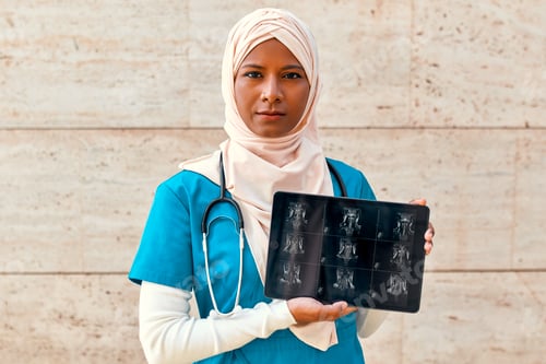 Preview: Muslim doctor outside near the hospital