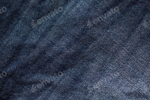 Preview: Denim texture. The background. Dark blue jeans.