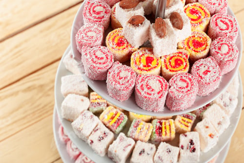 Preview: Turkish delight on a wooden table.