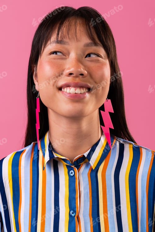 Preview: Beautiful asian woman portrait, asian woman smiling wearing colorful striped shirt