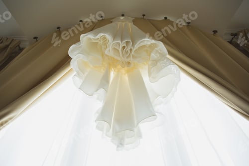 Preview: the wedding dress is hanging in the hotel