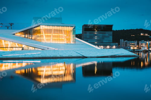 Preview: Oslo, Norway. Scenic Night Evening View Of Illuminated Norwegian National Opera And Ballet House