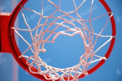 Preview: Basketball hoop, red ring and net, blue sky background, underview