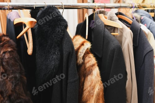 Preview: A fur coat, a coat with a fur collar,made of fox or rabbit fur in a second-hand store.
